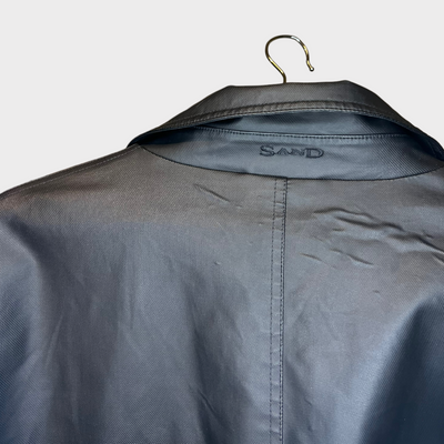 SAND coat jacket - logo cloe-up