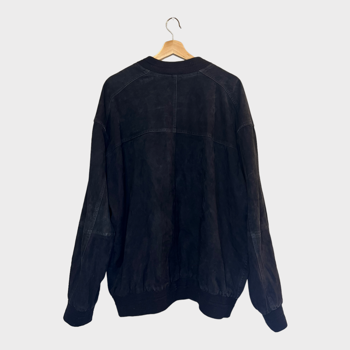 Suede jacket with a knitted collar in a black back