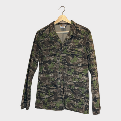 Front of the Carhartt Blazer jacket designed with an all over camo print