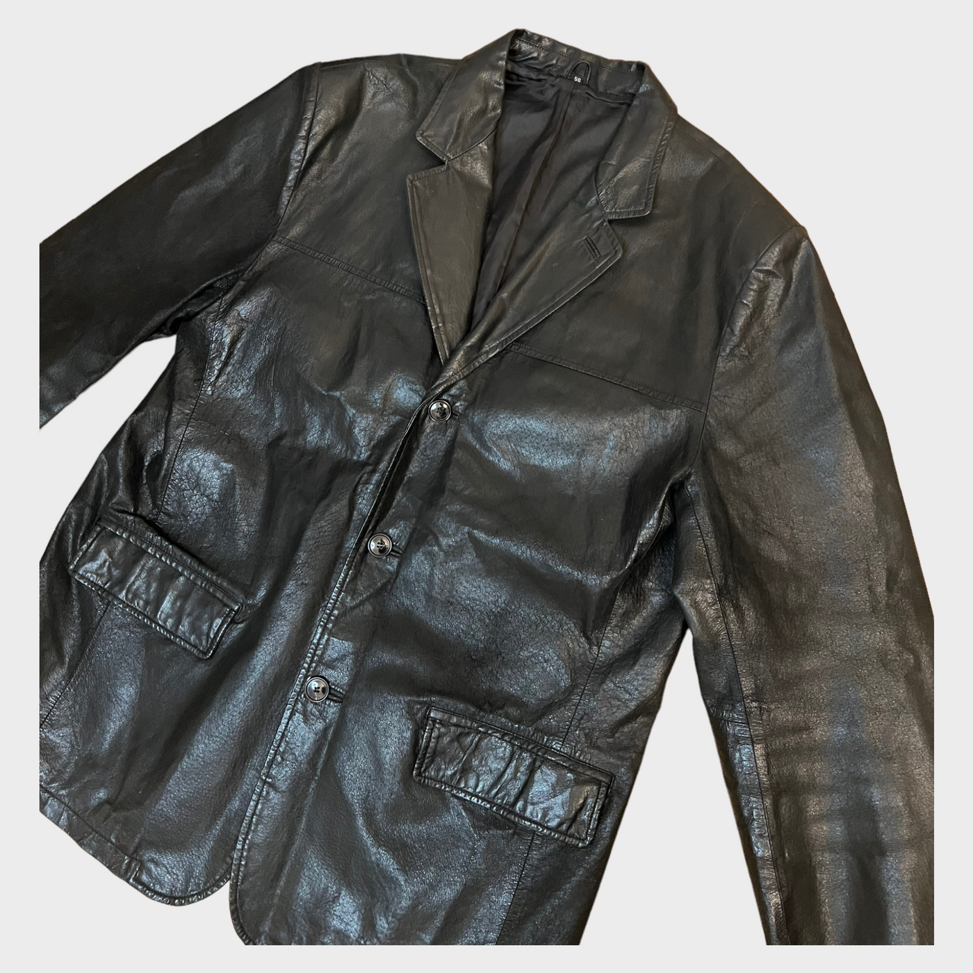 Close-up of the Leather Blazer Jacket in black leather.